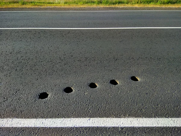 Five Holes Asphalt Road — Stock Photo, Image