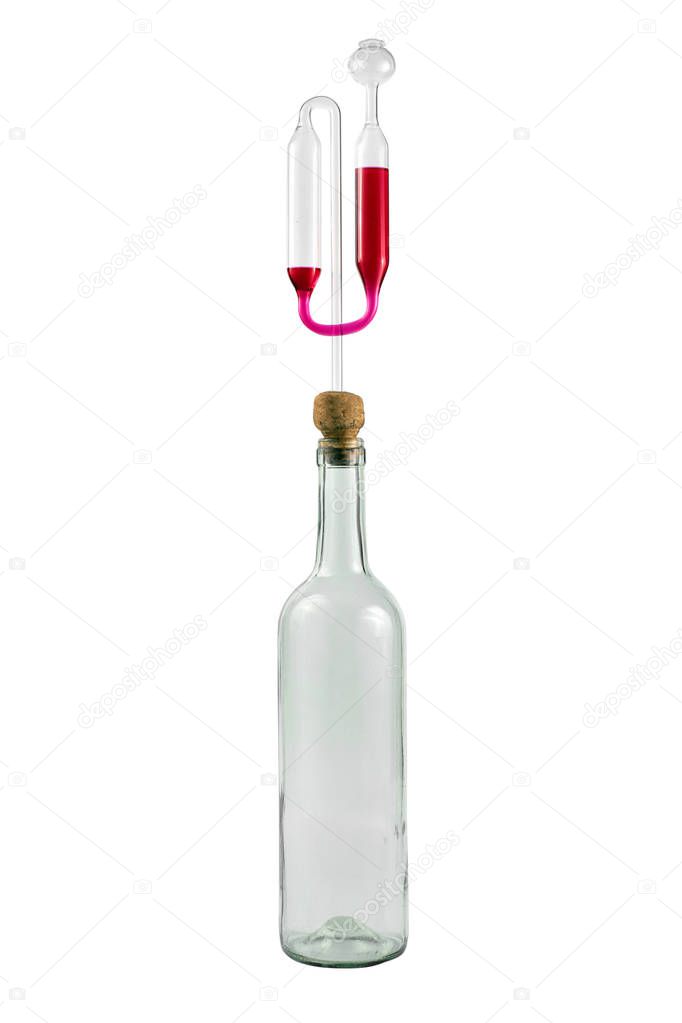 Glass bottle with cork and air lock, isolated on white background. Water seal valve, beer and wine making.