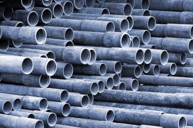 Metal borular yığın endüstriyel arka plan olarak 