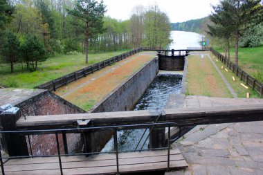 Paniewo Lock, the ninth lock and the only twin-chamber lock on the Augustow Canal in Poland. Built in 1828. clipart