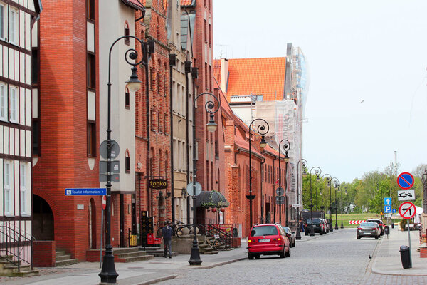 Elblag, Poland - May 9, 2019: Streets of Elblag. Old Town of Elblag was destroyed during World War II and is being restored since 1989 till now.