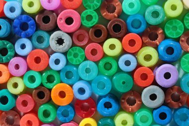 Vibration isolation rubbers from CD and DVD drives. Abstract technological background.