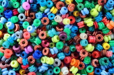 Vibration isolation rubbers from CD and DVD drives. Abstract technological background.