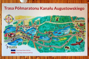 Plaska, Poland - May 2, 2019: Map of Half Marathon Race of Augustow Canal in Plaska, a village in Augustow County, Podlaskie Voivodeship, in north-eastern Poland. clipart