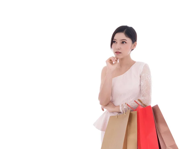 Young Woman Thinking Holding Shopping Bag Isolated White Background — Stock Photo, Image