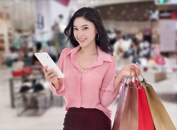 Young Woman Shopping Using Digital Tablet Mall Stock Image