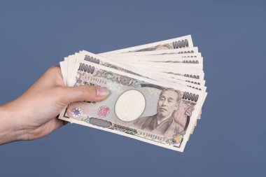 Japon banknot tutan el