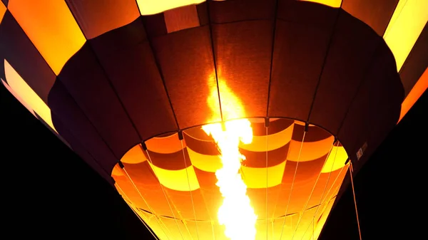 Close up of hot air balloon burner flame glowing at night — Stock Photo, Image