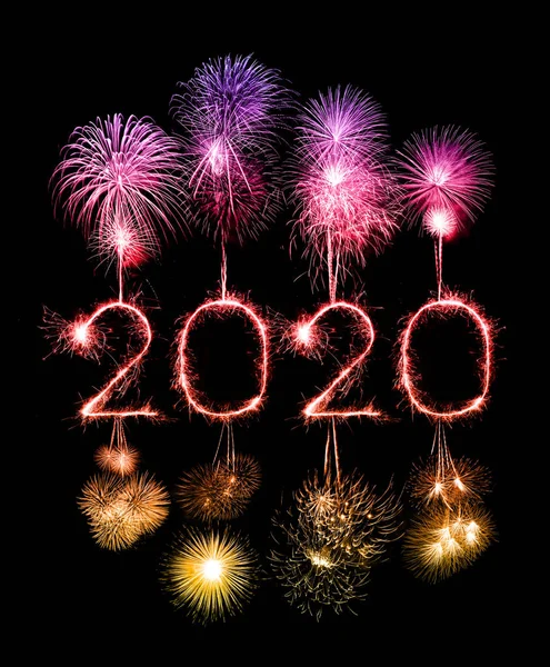 2020 happy new year fireworks written sparklers at night