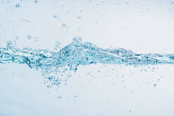 Water splash close up of splash of water forming shape isolated on white background. — Stock Photo, Image