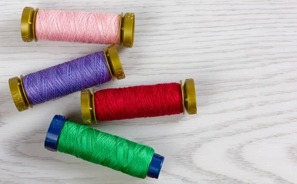 Four Colorful Thread Spools — Stock Photo, Image