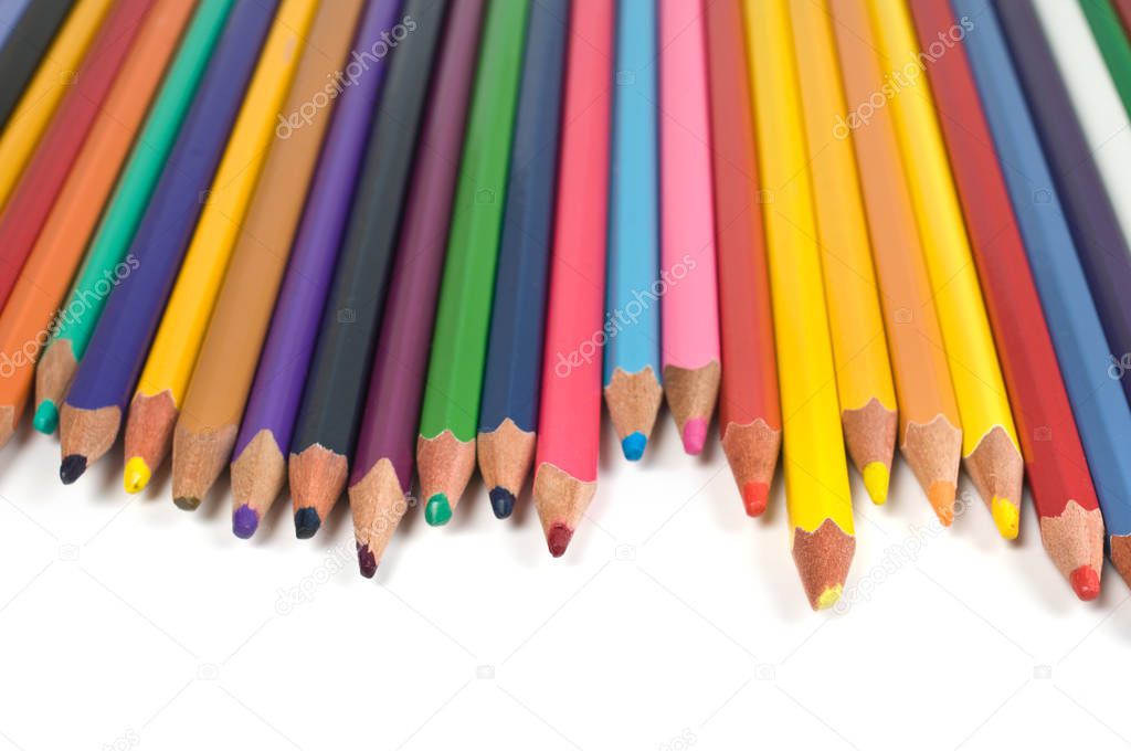 Colored pencils isolated on white background.