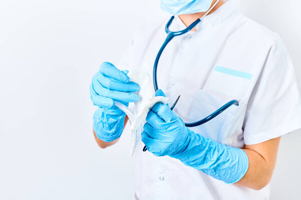 doctor opening medical compress