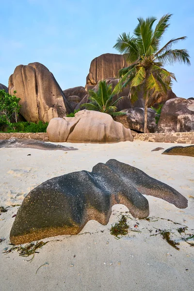 stock image Beautifully shaped granite boulders and a dramatic sunset at Ans