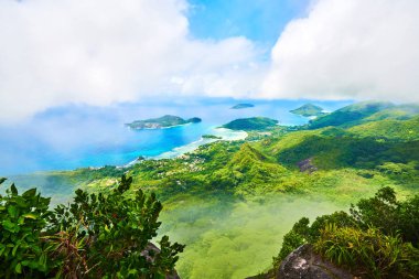 Panoramic view on therese island, bay ternay and little island in seychelles from Morne Blanc mountain clipart
