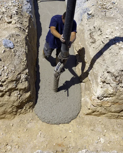 Building Construction Worker Pouring Cement Concrete Pump Tube — Stock Photo, Image