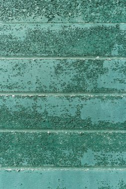 Paslı metal duvar doku yeşil tonda. Arka plan ve tasarım için doku.