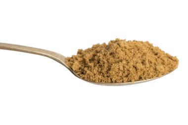 Kaşığı kimyon tozu. Beyaz arka planda izole