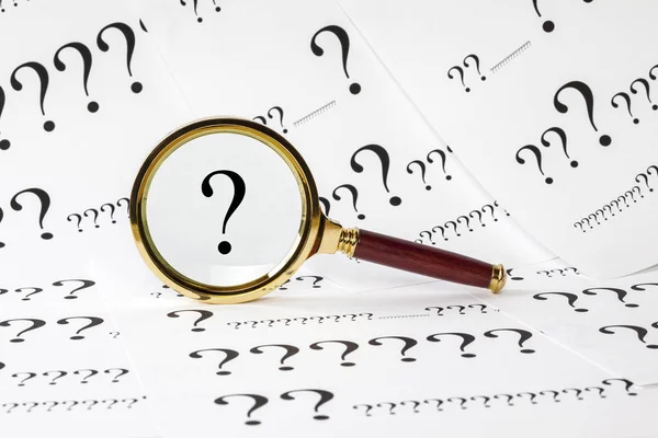 Question Concept with Magnifying Glass — Stock Photo, Image