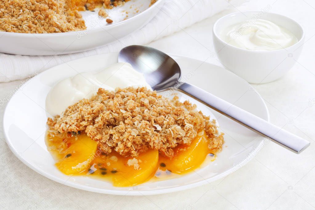 An unusual fruit crumble with peach and passion fruit. The crumble contains wholemeal flour, brown sugar and oats.