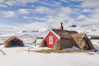 Turf House in Bakkageroi North Iceland clipart