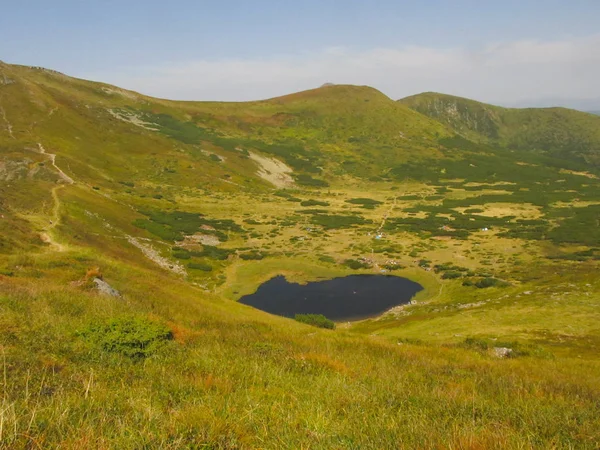 Highland lake in the Carpathian mountains in august. Nesamovyte lake, Ukraine.
