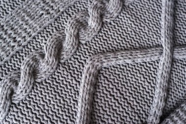 Gri örme kazak deseni yakın çekim