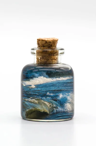 Sea inside a glass bottle, double exposure — Stock Photo, Image