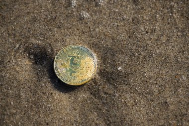 Bitcoin sikke üzerinde kum su ekonomi finans 