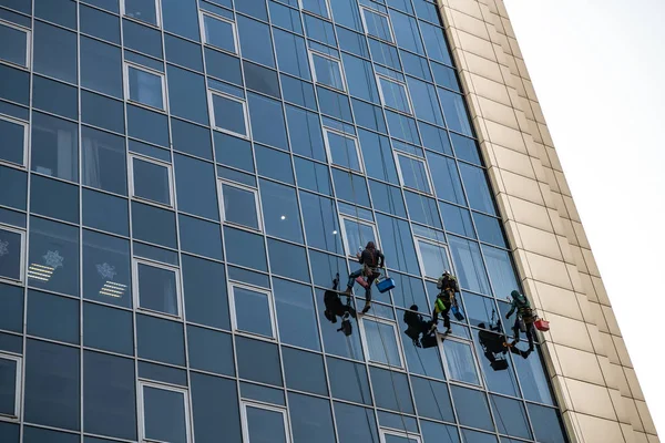 Glass clean man building tower work business