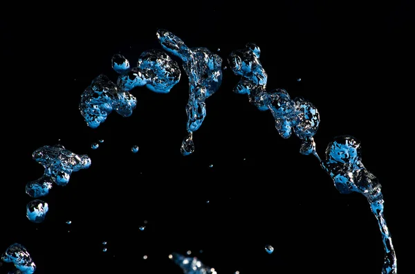 Salpicadura de agua movimiento naturaleza luz abstracta de cerca — Foto de Stock