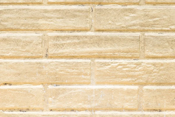 Altın tuğla duvar arka plan. Altın boyalı tuğla duvar