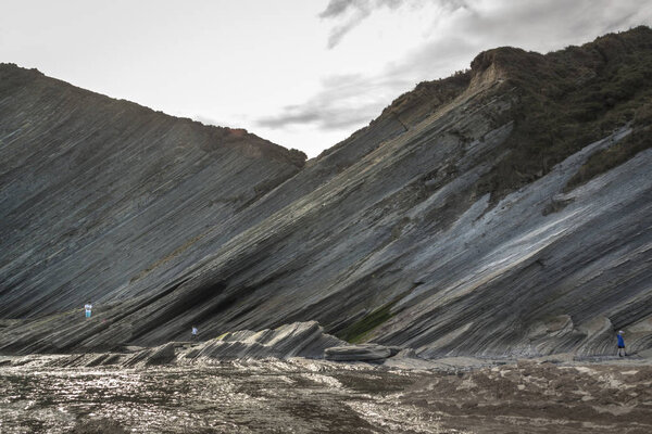 Geological rock formations and cliffs on the Flysch route. Cantabrian Sea. In Vizcaya, Basque Country. Spain