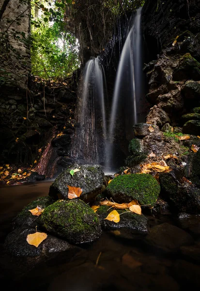 Waterfall in the ruins of an old mill. Nature scene, magical and relaxing — Stock Image Waterfall Ruins Old Mill Nature Scene Magical Relaxing Stock Photo
