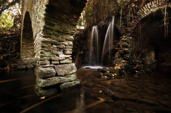Waterfall in the ruins of an old mill. Nature scene, magical and relaxing — Stock Image Waterfall Ruins Old Mill Nature Scene Magical Relaxing Stock Picture