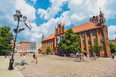 Torun, Poland - June 01, 2018: Main square in old town of Torun. Torun is birthplace of the astronomer Nicolaus Copernicus. clipart