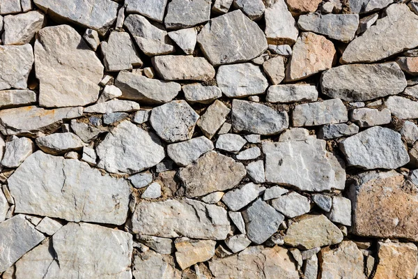 Textuur Van Een Stenen Muur Als Achtergrond — Stockfoto