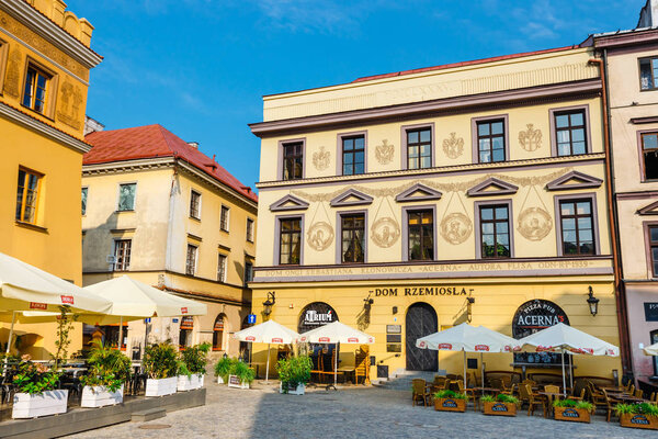 Lublin, Poland, September 01, 2018: Historic tenements and outdoor restaurants in the old town in Lublin, Poland.