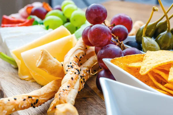 Plate Delicious Tortilla Nachos Grapes Pretzels Olive — Stock Photo, Image