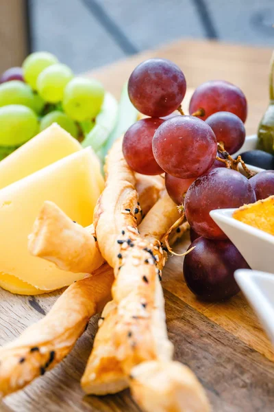 Plate Delicious Tortilla Nachos Grapes Pretzels Olive — Stock Photo, Image