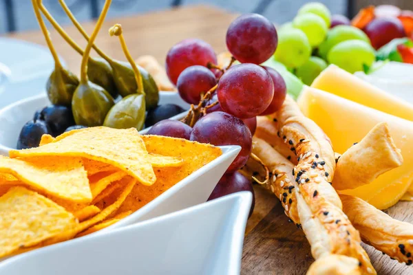 Plate Delicious Tortilla Nachos Grapes Pretzels Olive — Stock Photo, Image