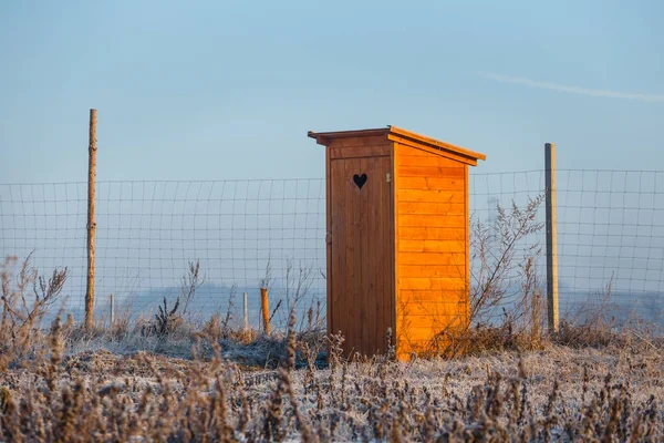 An old wooden toilet building at sunrise — Stock Image Old Wooden Toilet Building Sunrise Stock Picture