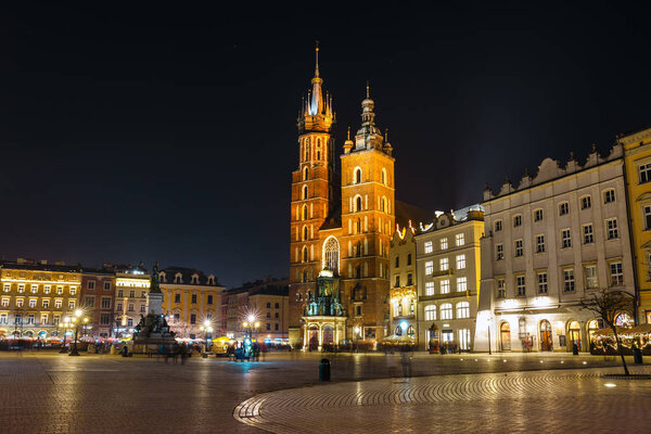 Krakow, Poland, February 16, 2019: St. Mary's Church at night in Krakow, Poland