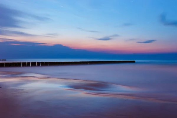 Breakwater al tramonto, Mar Baltico, Polonia — Foto Stock