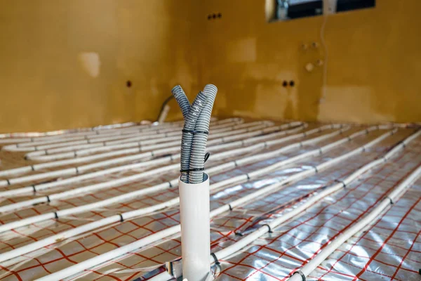 Close up on water floor heating system interior — Stock Photo, Image