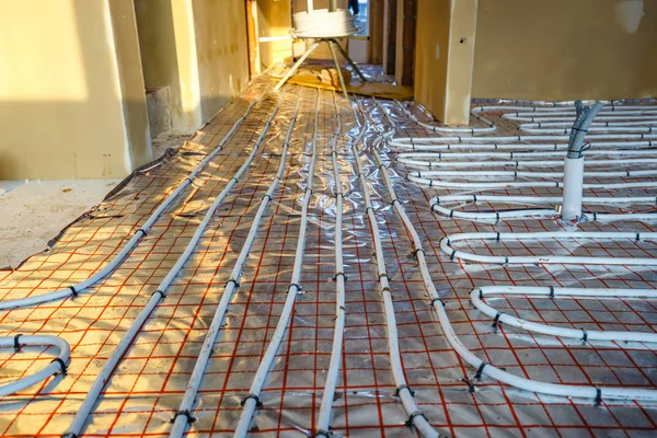 Close up on water floor heating system interior — Stock Photo, Image