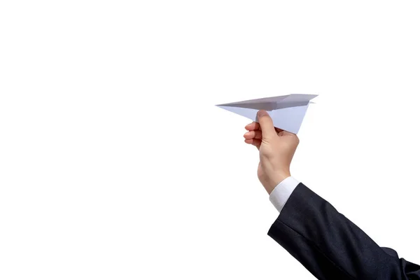Επιχειρηματίας χέρι που κρατά το αεροπλάνο χαρτί σε λευκό φόντο . — Φωτογραφία Αρχείου