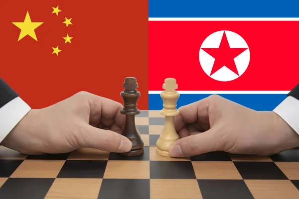 チェスのゲームで表される中国北朝鮮韓国サミット. — ストック写真