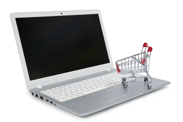 Internet online vásárlás koncepció a számítógép és a kosár — Stock Fotó
