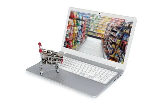 Conceito de compras on-line na Internet com computador e carrinho — Fotografia de Stock